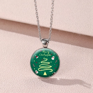 Detailed macro view of Merry Christmas glass pendant with snowman and silver chain