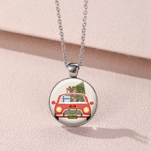 Vintage Christmas tree necklace featuring a red car illustration in a glass cabochon pendant