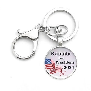 Silver metal keychain with Kamala for President 2024 flag glass cabochon pendant