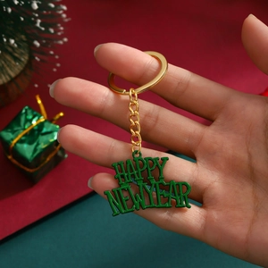 Minimalist Happy New Year letter keychain in green enamel and gold finish for holidays