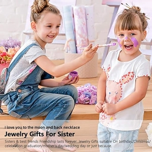 Sisters heart and moon necklace gift set for birthdays shown in a lifestyle scene