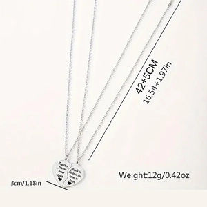 Polished stainless steel heart puzzle necklace for couples with engraved sentimental text
