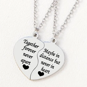 Polished stainless steel heart puzzle necklace set with Together Forever engravings