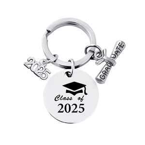 Detailed close-up of Class of 2025 stainless steel graduation keychain with engraved charms