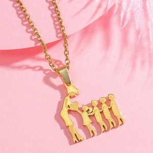 Detailed view of family silhouette pendant in gold plating with mother and four children
