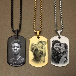 Detail view of custom photo dog tags in black, gold, and silver stainless steel