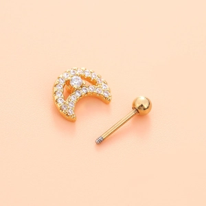 Macro shot of gold crescent moon stud with white zircons and threaded barbell back