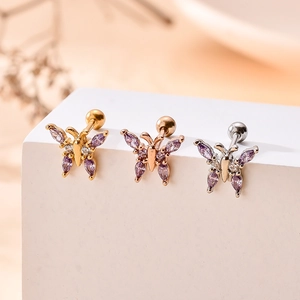 Clous d'oreilles papillon en trois couleurs avec pierres mauves et fermoirs à vis