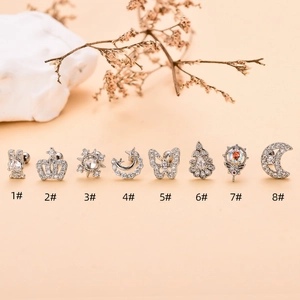 Eight silver surgical steel stud earrings with cubic zirconia in assorted geometric shapes