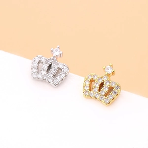 Elegant crown cartilage stud earrings in gold and silver finish with pavé set zircons