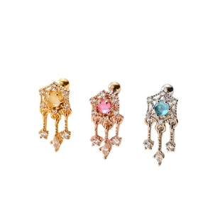 Star-shaped zircon cartilage earrings in gold, rose gold and silver with zircon tassels