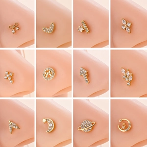 Set di 12 piercing per il naso dorati in acciaio inossidabile con cuori, lune e zirconi