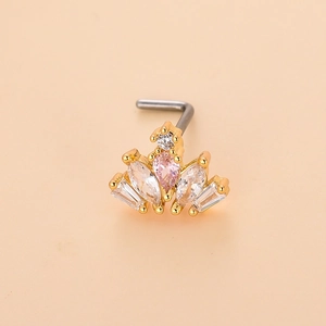 Detailed close-up of a gold L-shaped nose stud with pink water drop zirconia and crown motif