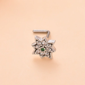 L-shaped nose stud featuring snowflake design with green gem and white zircons