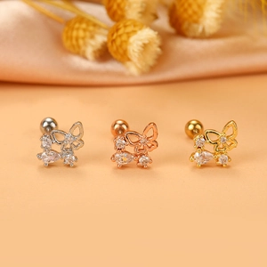 Piercing a farfalla in tre colori metallici con zirconi scintillanti e chiusura a sfera