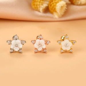 Orecchini a forma di fiore a stella in argento, oro e oro rosa con pietre di zircone