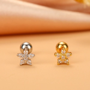 Macro detail of 16G stainless steel flower stud earrings with micro-set cubic zirconia