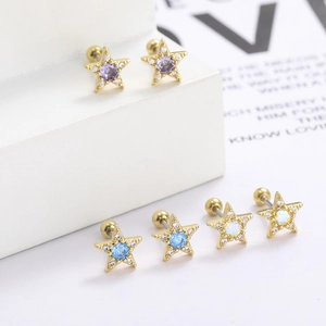 Gold star cartilage earrings with purple and blue zircon crystals and screw ball backings