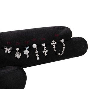 Set of 6 stainless steel cross and zircon ear studs in silver finish on black display