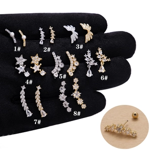 Kit boucles d'oreilles helix 20G en acier avec ailes en zircone et motifs d'étoiles