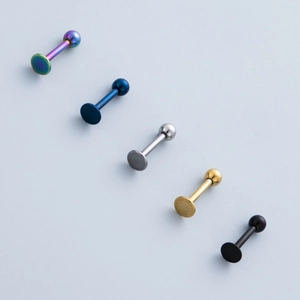 Five 316L stainless steel ball labret studs in rainbow, blue, silver, gold and black
