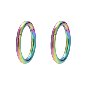 Rainbow gradient stainless steel piercing rings for nose or lip on white background