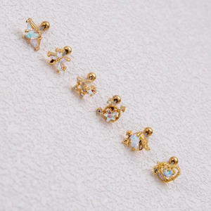 Titanium steel stud earrings set featuring aurora gems and ball back in polished gold finish
