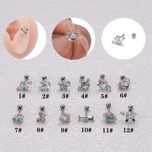 Titanium steel cartilage stud set with 12 styles including star, heart, and saturn shapes
