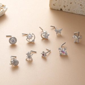 L-shaped surgical steel nose stud set with cubic zirconia butterfly and star designs