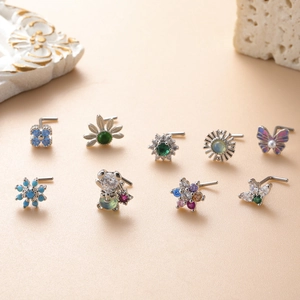 Set of 9 L-shaped stainless steel nose studs with colorful zircon butterfly and flower designs
