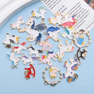 Close-up of assorted colorful enamel unicorn alloy charms for DIY jewelry making