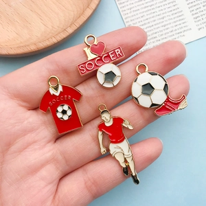Cartoon soccer theme enamel charms with jersey and ball designs in gold finish