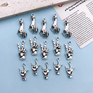 Antique silver zinc alloy gesture charms including OK, Peace, and Love signs for DIY jewelry