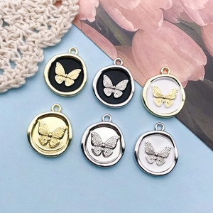 Detailed collection of 18x21mm butterfly round charms in multiple colors for DIY jewelry