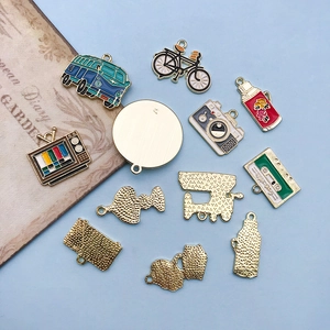 Set of retro alloy oil-dripping charms with vintage camera and radio shapes for DIY jewelry