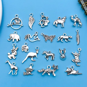 Set of vintage silver animal pendants including elephant and cat for DIY jewelry making