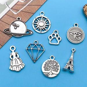 Detailed collection of vintage silver alloy charms for DIY jewelry and necklaces