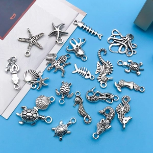 Detail of silver alloy ocean charms including starfish and seahorse for DIY jewelry