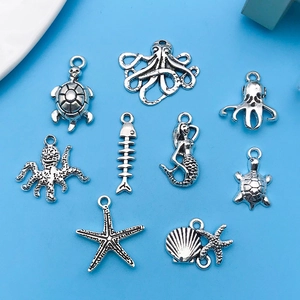 Collection of antique silver ocean charms including octopus and sea turtle for DIY jewelry