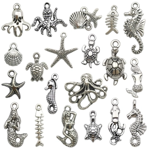 Antique silver ocean charms set featuring seahorse, starfish, and turtle for DIY jewelry