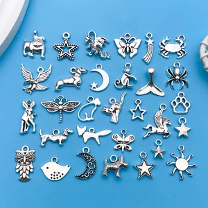 Assorted antique silver alloy charms featuring animals and stars for DIY jewelry making