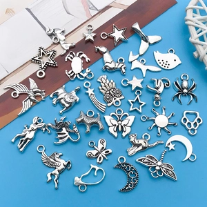 Mix of silver alloy charms including animal and sun shapes for DIY jewelry making