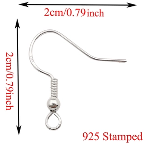 Macro detail of S925 sterling silver ear hook with 2cm size markings for DIY jewelry