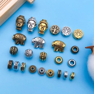 DIY jewelry making kit featuring antique metal alloy spacer beads in various motifs