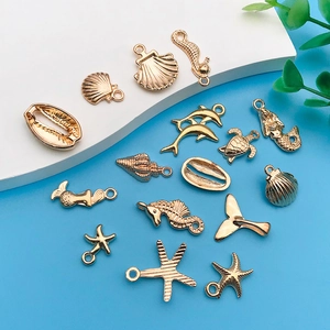 Gold ocean animal charms set including seahorse and starfish for DIY jewelry making