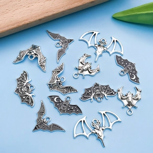 Set of 11 antique silver bat charms for DIY jewelry making and Halloween accessories