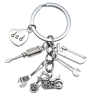 Antique silver dad heart keychain with miniature tool charms and motorcycle pendant