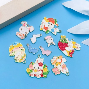 Detailed assortment of colorful enamel bunny and flower charms for DIY jewelry making