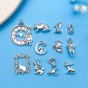 Set of 11 antique silver rabbit charms including pocket watch and moon rabbit for DIY jewelry