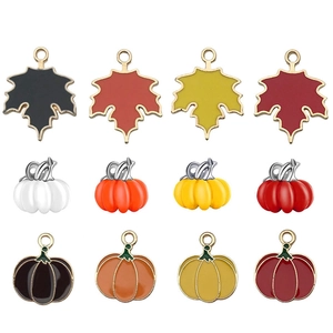 Autumn DIY jewelry charms set featuring colorful pumpkin and maple leaf enamel pendants